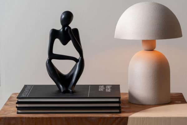 statue wondering black